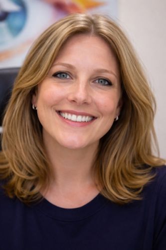 Close-up of woman several weeks after IPL treatment showing clearer skin and bright, healthy-looking eyes in Baltimore eye care practice